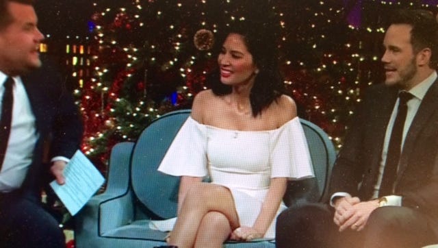 Chris Pratt, right, and Olivia Munn, tell the host of "The Late Late Show with James Corden" about what happened when Pratt tried to impress Aaron Rodgers while manning the grill.