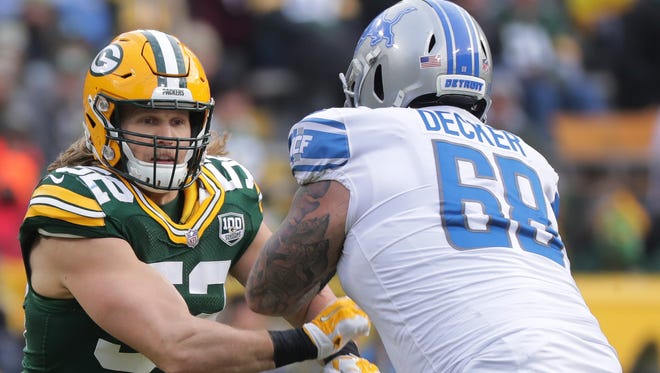 Green Bay Packers outside linebacker Clay Matthews (52) rushes the quarterback while being blocked by Detroit Lions offensive tackle Taylor Decker (68) during the third quarter of their game Sunday, December 30, 2018 at Lambeau Field in Green Bay, Wis. The Detroit Lions beat the Green Bay Packers 31-0.

MARK HOFFMAN/MILWAUKEE JOURNAL SENTINEL