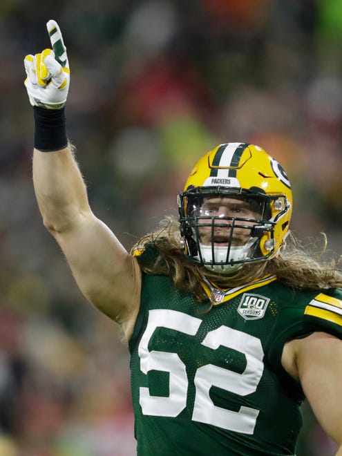 Green Bay Packers linebacker Clay Matthews (52) celebrates a fourth quarter sack against San Francisco 49ers quarterback C.J. Beathard (3) during their football game Monday, Oct. 15, 2018, at Lambeau Field in Green Bay, Wis. 
Dan Powers/USA TODAY NETWORK-Wisconsin