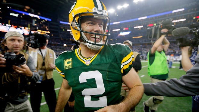 Green Bay Packers kicker Mason Crosby (2) smiles after making the game-winning field goal to beat the Dallas Cowboys in an NFL divisional playoff football game Sunday, Jan. 15, 2017, in Arlington, Texas. The Packers won 34-31.