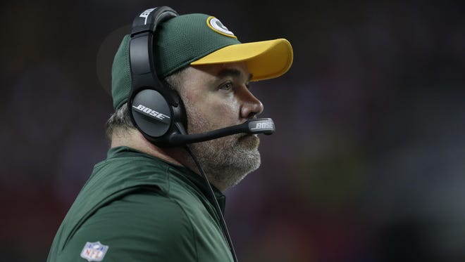 PACKERS23 PACKERS  - Green Bay Packers head coach Mike McCarthy looks at the clock during the 4th quarter of the Green Bay Packers 44-21 NFC Championship loss against the Atlanta Falcons at the Georgia Dome in Atlanta, Georgia on Sunday, January 22, 2017.