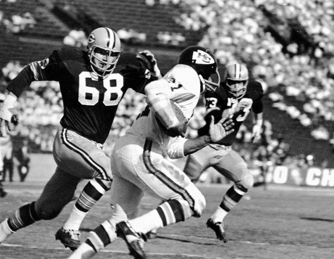 Green Bay Packers guard Gale Gillingham chases down an unidentified Kansas City Chief during Super Bowl I. The Packers won 35-10 over the Kansas City Chiefs on January 15, 1967, at the Los Angeles Memorial Coliseum in Los Angeles, Calif.