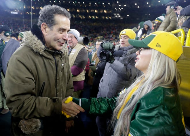 Actor Tony Shalhoub talks with Liv Morgan before the Green Bay Packers take on the Kansas City Chiefs during their football game Sunday, December 3, 2023, at Lambeau Field in Green Bay.