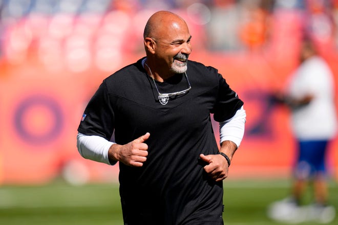 Las Vegas Raiders interim head coach Rich Bisaccia takes the field prior to an NFL football game against the Denver Broncos, Sunday, Oct. 17, 2021, in Denver. (AP Photo/Jack Dempsey)