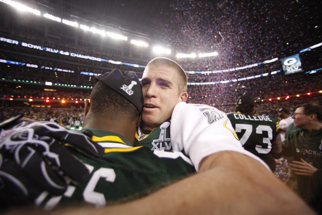 Green Bay Packers receiver Jordy Nelson, right, hugs fellow receiver James Jones after the Packers defeated the Steelers in the Super Bowl. The Green Bay Packers face the Pittsburgh Steelers in Super Bowl XLV in Arlington, Texas Sunday February 6, 2011.