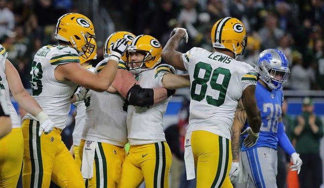 Mason Crosby #2 of the Green Bay Packers kicks the game winning field goal during the game against the Detroit Lions at Ford Field on December 29, 2019 in Detroit, Michigan. Green Bay defeated Detroit 23-20.