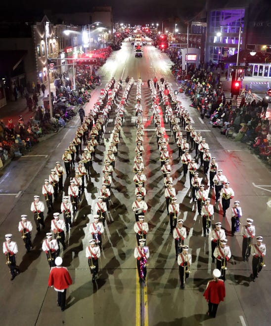 The Kimberly High School band during the 49th annual Downtown Appleton Christmas Parade on Tuesday, Nov. 26, 2019, on College Ave. in Appleton, Wis.
