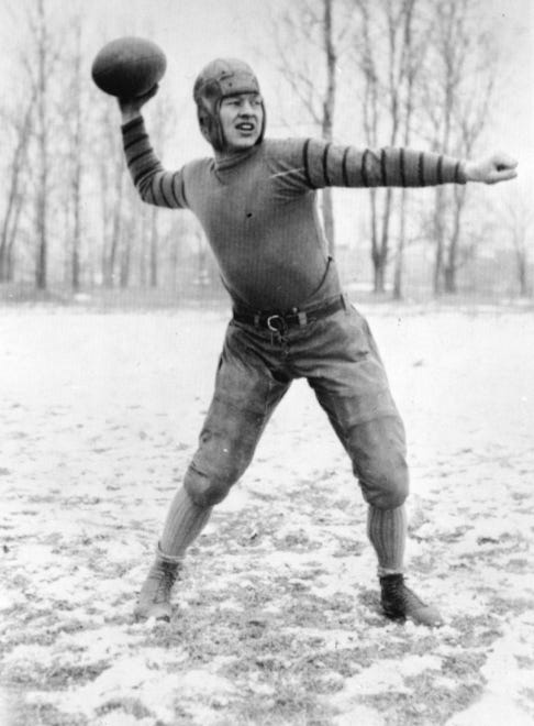 Earl L. (Curly) Lambeau is pictured in the early 1920s as a quarterback on the Green Bay Packers a team which he help found. The picture was taken during a Green Bay practice session in the snow.