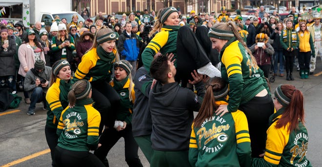 Cheerleaders do a routine for Packers fans during a pep rally hosted by the City of Green Bay on Friday, January 10, 2020, at Packers Heritage Trail in Green Bay, Wis. Ebony Cox/USA TODAY NETWORK-Wisconsin