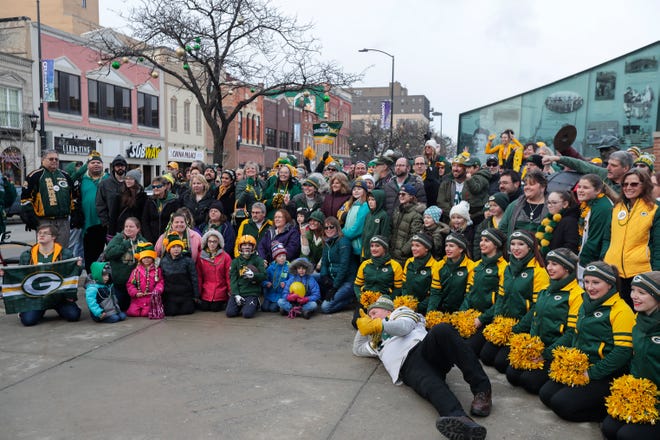 Packers fans gather after the pep rally to take a picture on Friday, January 10, 2020, at Packers Heritage Trail in Green Bay, Wis. Ebony Cox/USA TODAY NETWORK-Wisconsin