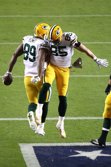 Marcedes Lewis #89 of the Green Bay Packers is congratulated by teammate Robert Tonyan #85 after scoring a touchdown against the San Francisco 49ers during the second quarter at Levi's Stadium on Nov. 5, 2020 in Santa Clara, California.