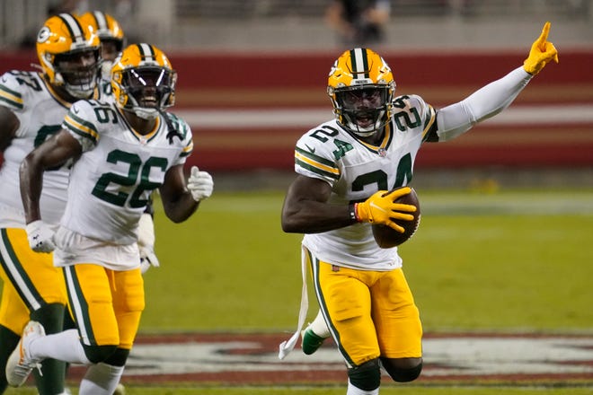 Green Bay Packers safety Raven Greene (24) celebrates after intercepting a pass against the San Francisco 49ers during the first half of an NFL football game in Santa Clara, Calif., Thursday, Nov. 5, 2020.