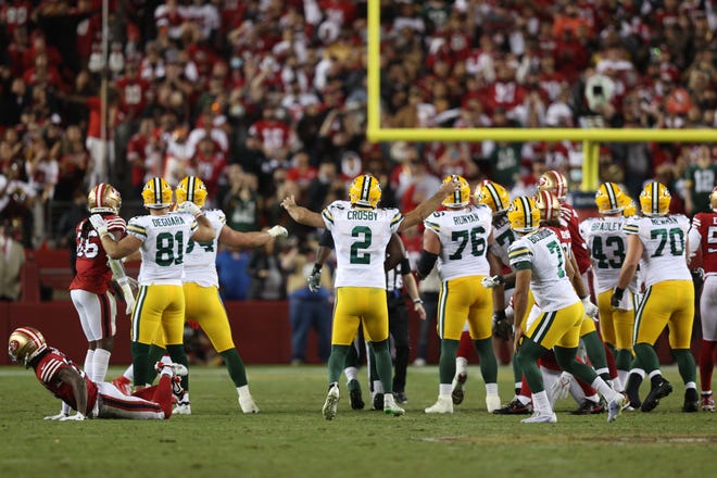 Mason Crosby (2) of the Green Bay Packers celebrates after kicking the game-winning field goal against the San Francisco 49ers in the game at Levi's Stadium on September 26, 2021 in Santa Clara, California.