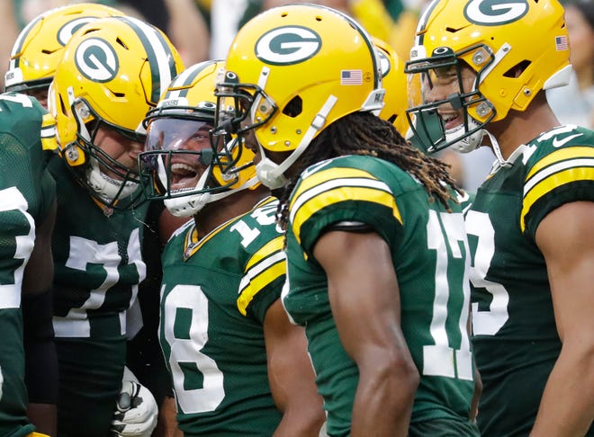 Green Bay Packers wide receiver Randall Cobb (18) is swarmed by teammates after scoring a touchdown against the Pittsburgh Steelers during their football game Sunday, October 3, 2021, at Lambeau Field in Green Bay, Wis. 
Dan Powers/USA TODAY NETWORK-Wisconsin