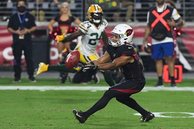 GLENDALE, ARIZONA - OCTOBER 28: Rondale Moore #4 of the Arizona Cardinals fumbles a punt during the first half against the Green Bay Packers at State Farm Stadium on October 28, 2021 in Glendale, Arizona. (Photo by Norm Hall/Getty Images)