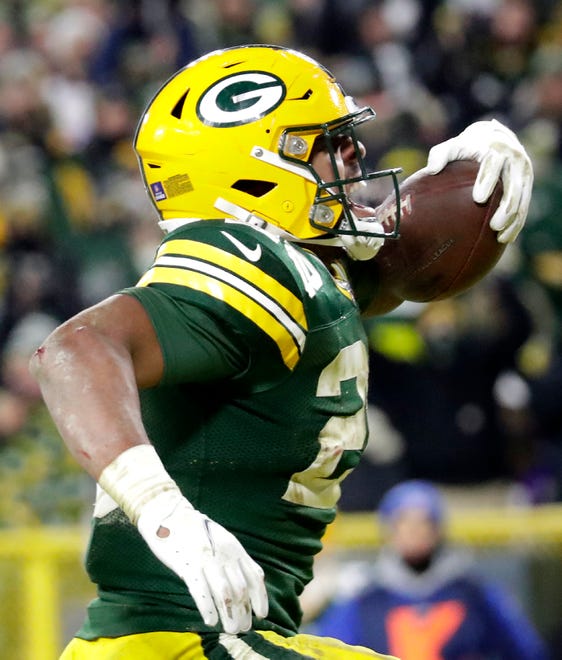 Green Bay Packers running back A.J. Dillon (28) celebrates a fourth quarter touchdown run against  the Minnesota Vikings on Sunday, January 2, 2022, at Lambeau Field in Green Bay, Wis. 
Wm. Glasheen USA TODAY NETWORK-Wisconsin
