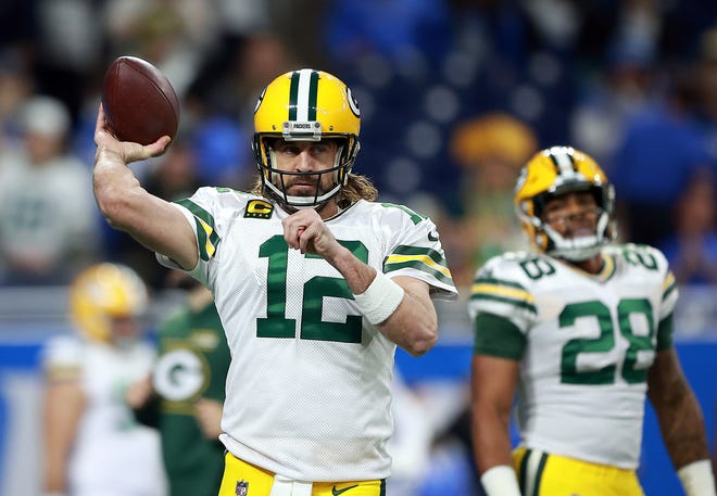 DETROIT, MICHIGAN - JANUARY 09: Aaron Rodgers of the Green Bay Packers warms up prior to a game against the Detroit Lions at Ford Field on January 09, 2022 in Detroit, Michigan.