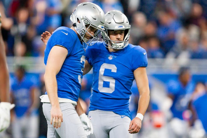 Jan 9, 2022; Detroit, Michigan, USA; Detroit Lions kicker Riley Patterson (6) celebrates with punter Jack Fox (3) during the fourth quarter against the Green Bay Packers at Ford Field. Mandatory Credit: Raj Mehta-USA TODAY Sports