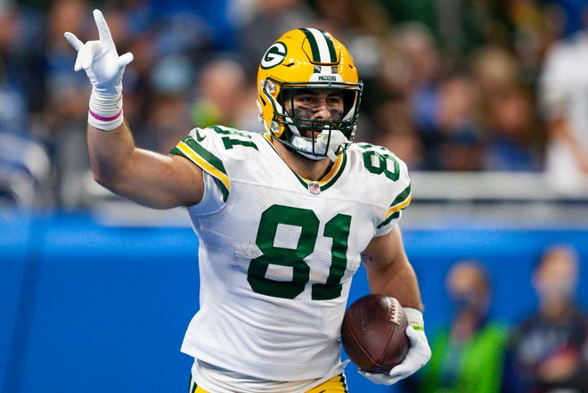 Jan 9, 2022; Detroit, Michigan, USA; Green Bay Packers tight end Josiah Deguara (81) celebrates after a touchdown catch during the fourth quarter against the Detroit Lions at Ford Field. Mandatory Credit: Raj Mehta-USA TODAY Sports