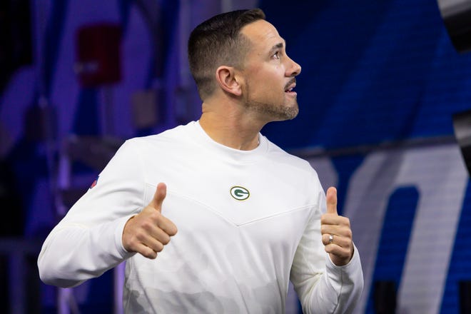 Jan 9, 2022; Detroit, Michigan, USA; Green Bay Packers head coach Matt LaFleur gives thumbs up to the fans before the game against the Detroit Lions at Ford Field.