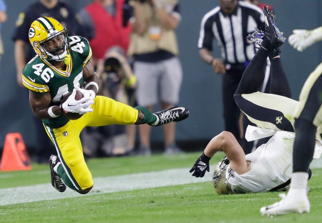 Green Bay Packers safety Micah Abernathy (46) intercepts a pass intended for New Orleans Saints tight end Taysom Hill (7) during their football game Friday, August 19, 2022, at Lambeau Field in Green Bay, Wis. 
Dan Powers/USA TODAY NETWORK-Wisconsin