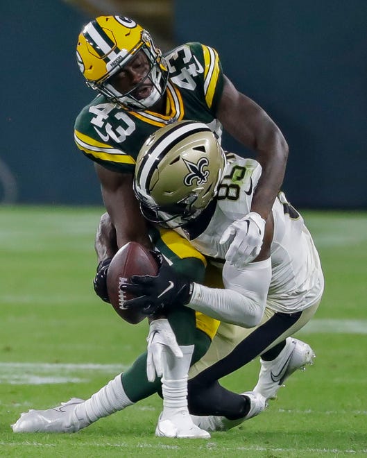 Green Bay Packers cornerback Kiondre Thomas (43) breaks up a pass intended for New Orleans Saints wide receiver Kirk Merritt (85) during their football game on Friday, August 19, 2022, at Lambeau Field in Green Bay, Wis. The Packers won the game, 20-10.
Tork Mason/USA TODAY NETWORK-Wisconsin
