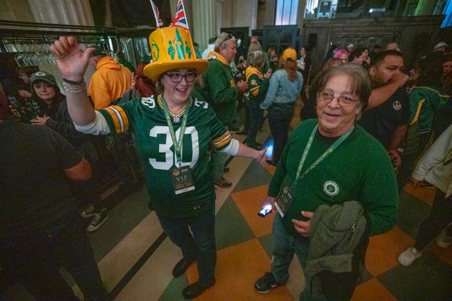 Jill and Robert Boender socialize during a rally put on by Ashwaubenon-based Event USA Friday, October 7, 2022 in London. The Packers will play their first game ever in the United Kingdom on Sunday against the New York Giants. About 750 people attend the event. The company was formerly known as Packer Fan Tours. They are from Guilford, Conn.