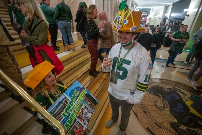 Anne Seymour, right, and her nephew A.J. Seymour socialize during a rally for the Green Bay Packers put on by Ashwaubenon-based Event USA Friday, October 7, 2022 in London. The Packers will play their first game ever in the United Kingdom on Sunday against the New York Giants. About 750 people attend the event. The company was formerly known as Packer Fan Tours. They are from Washington D.C. and Davis, Calif., respectively.