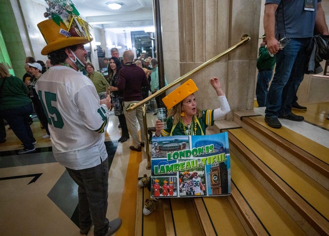 Anne Seymour, right, and her nephew A.J. Seymour lead a cheer during a rally for the Green Bay Packers put on by Ashwaubenon-based Event USA Friday, October 7, 2022 in London. The Packers will play their first game ever in the United Kingdom on Sunday against the New York Giants. About 750 people attend the event. The company was formerly known as Packer Fan Tours. They are from Washington D.C. and Davis, Calif., respectively.