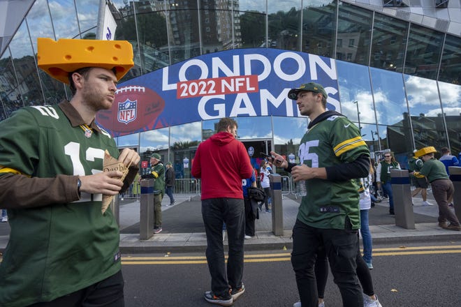 Fans circulate before the Green Bay Packers game against the New York Giants Sunday, October 9, 2022 outside Tottenham Hotspur Stadium in London. The Green Bay Packers will play their first game ever in the United Kingdom on Sunday against the New York Giants.