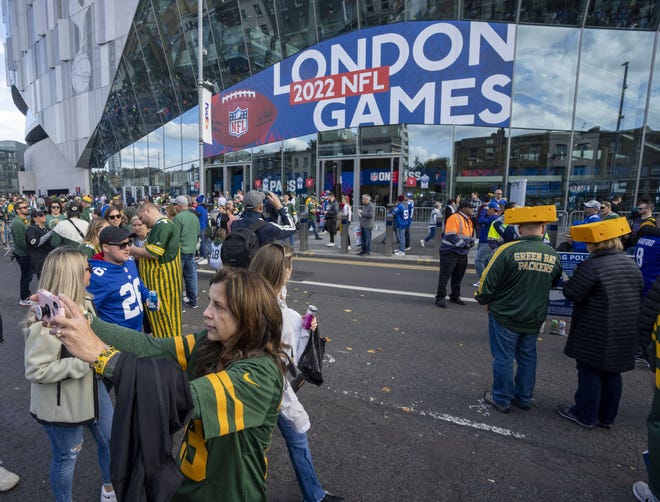 A fan makes a selfie before the Green Bay Packers game against the New York Giants Sunday, October 9, 2022 outside Tottenham Hotspur Stadium in London. The Green Bay Packers will play their first game ever in the United Kingdom on Sunday against the New York Giants.