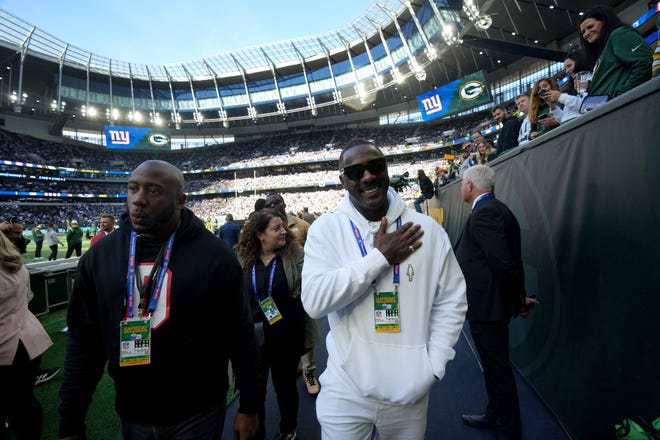 Oct 9, 2022; Tottenham, ENG;  English actor Idris Elba walks to sidelines before the Green Bay Packers game against the New York Giant at Tottenham Hotspur Stadium.