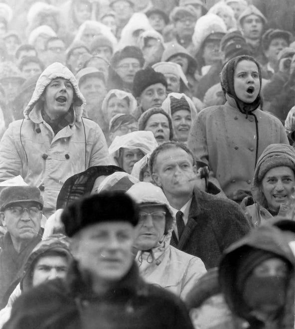 Green Bay Mayor Don Tilleman signifies concern by furrowing his brow and puffing on a pipe during the NFL championship game on Jan. 2, 1966, at Lambeau Field in Green Bay, Wis. The Packers defeated the Cleveland Browns 23-12.